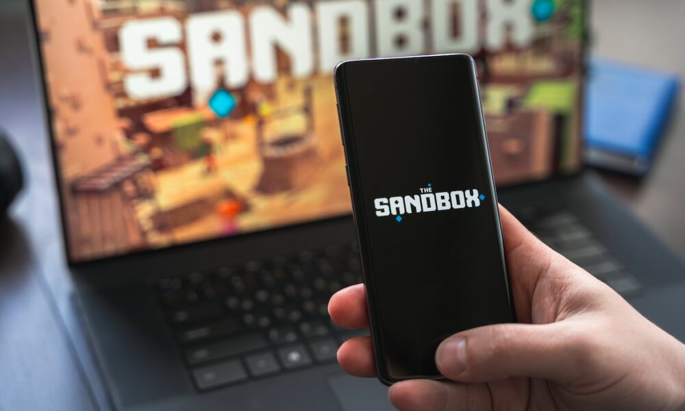 Ilustrasi altcoin Sandbox (SAND).