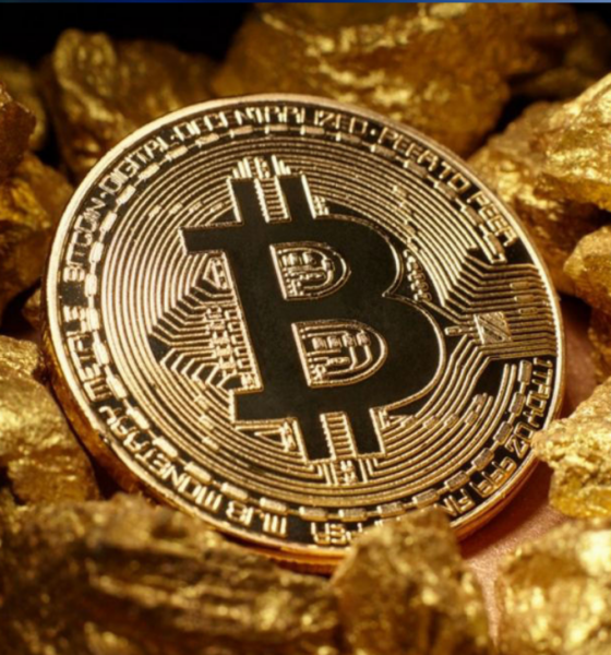 Ilustrasi Bitcoin vs emas.