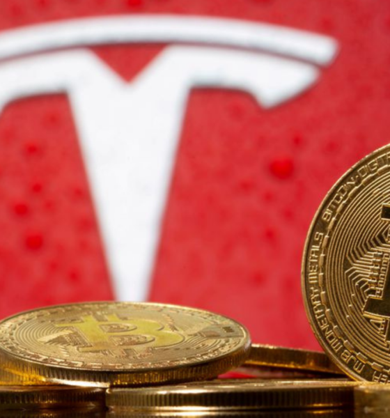 Ilustrasi Tesla jual Bitcoin.