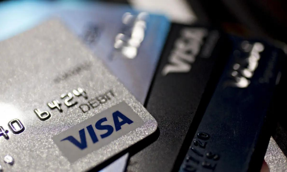 Ilustrasi perusahaan layanan pembayaran, Visa. Sumber: Getty Images.
