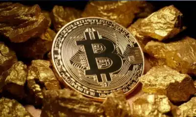 Ilustrasi Bitcoin vs emas.